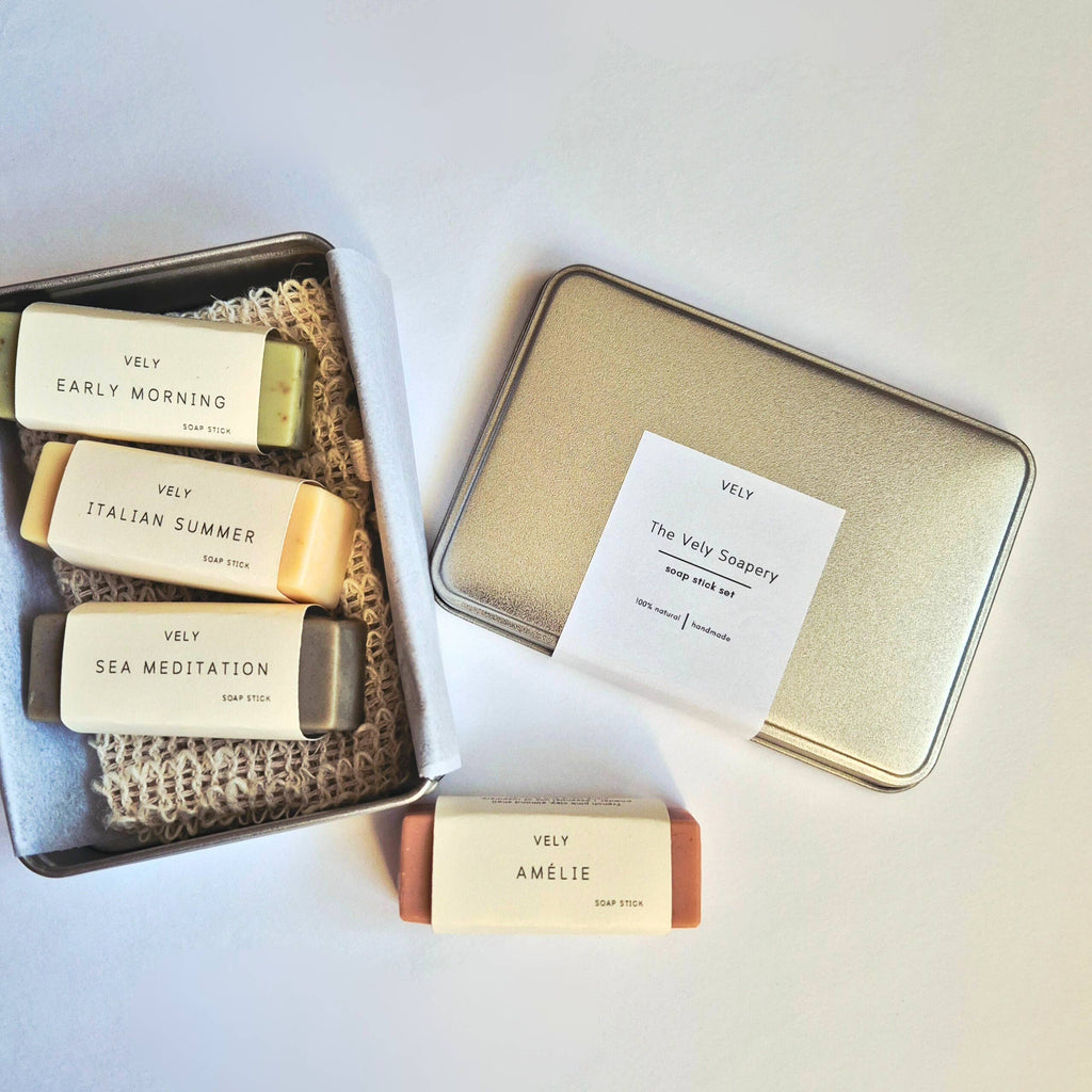 Set of 4 Vely soap bars in a tin box on a light background