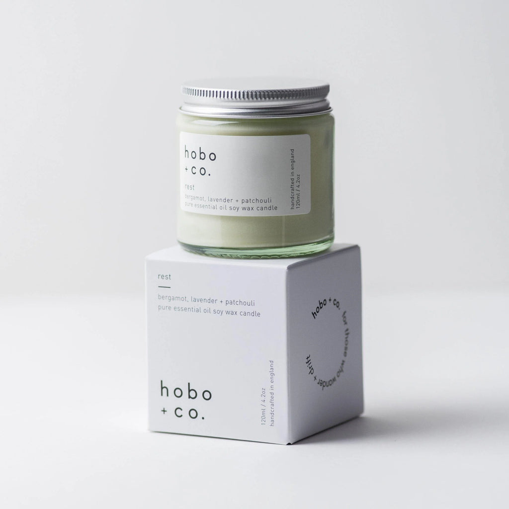 Hobo + Co candle and packaging on a white background