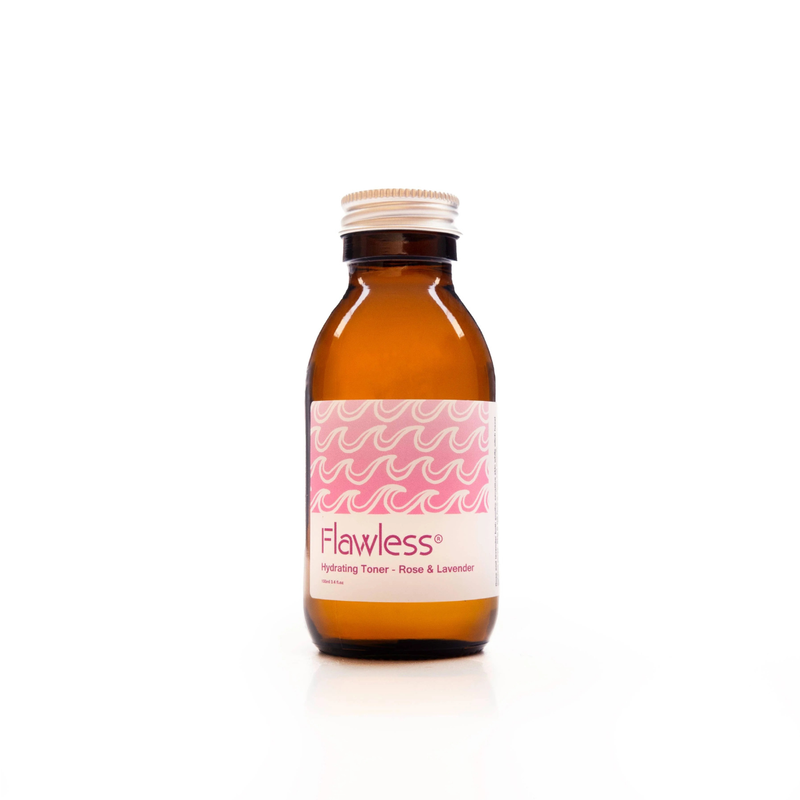 An amber glass bottle of Flawless Hydrating Rose Toner with a pink and white label, set against a plain white background.