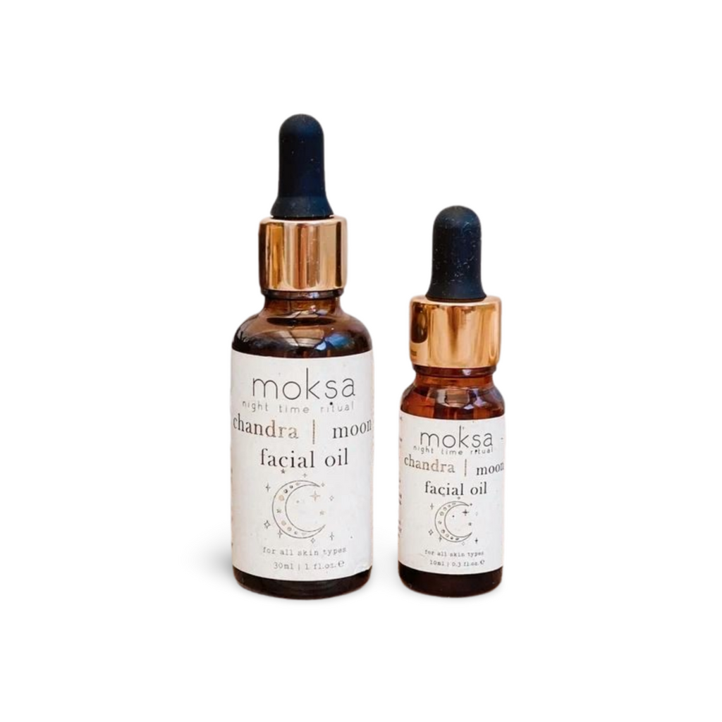 Two bottles of Moksa Chandra facial oil with droppers on a white background