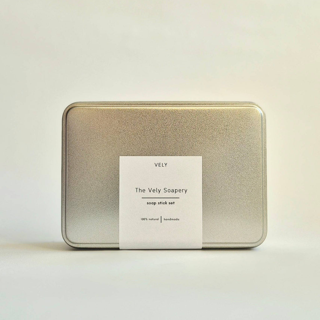 Silver tin with a label on a white background