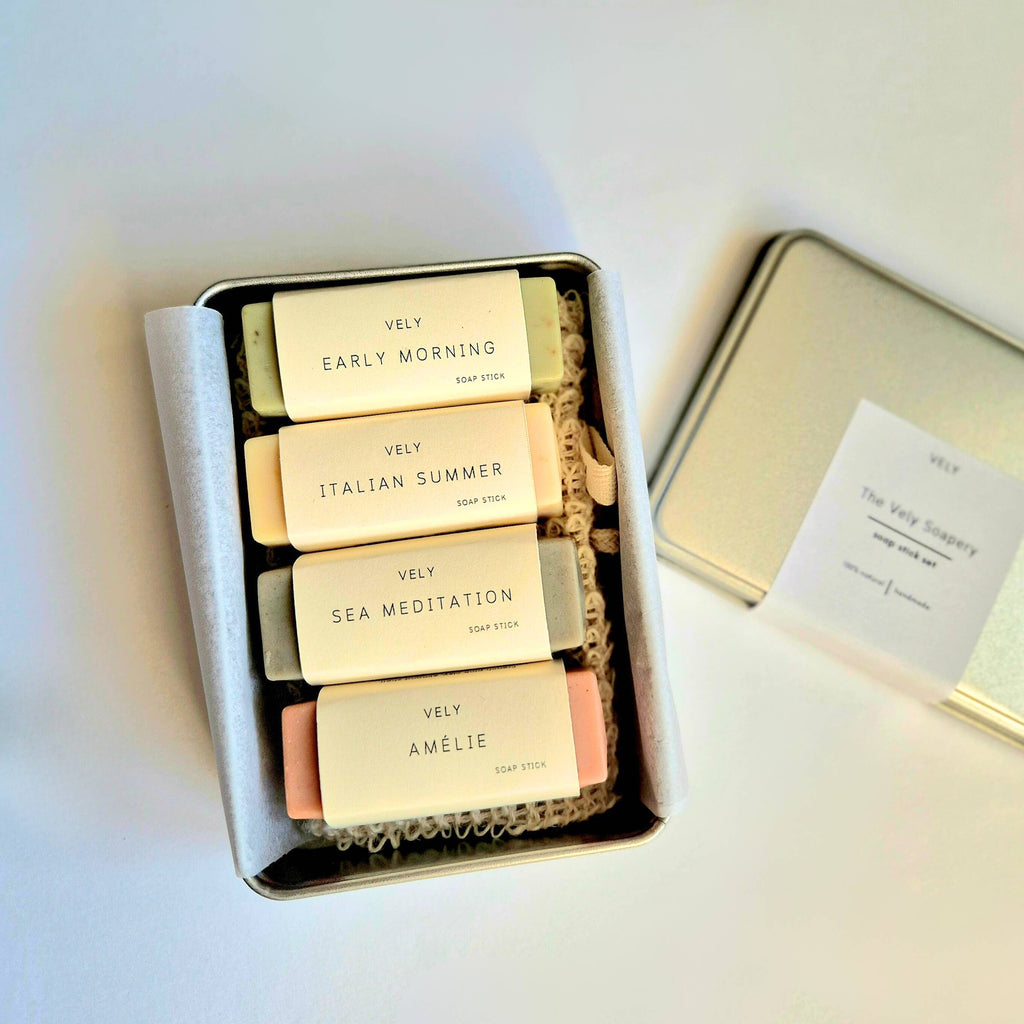 Set of 4 Vely soap bars in a box on a light background