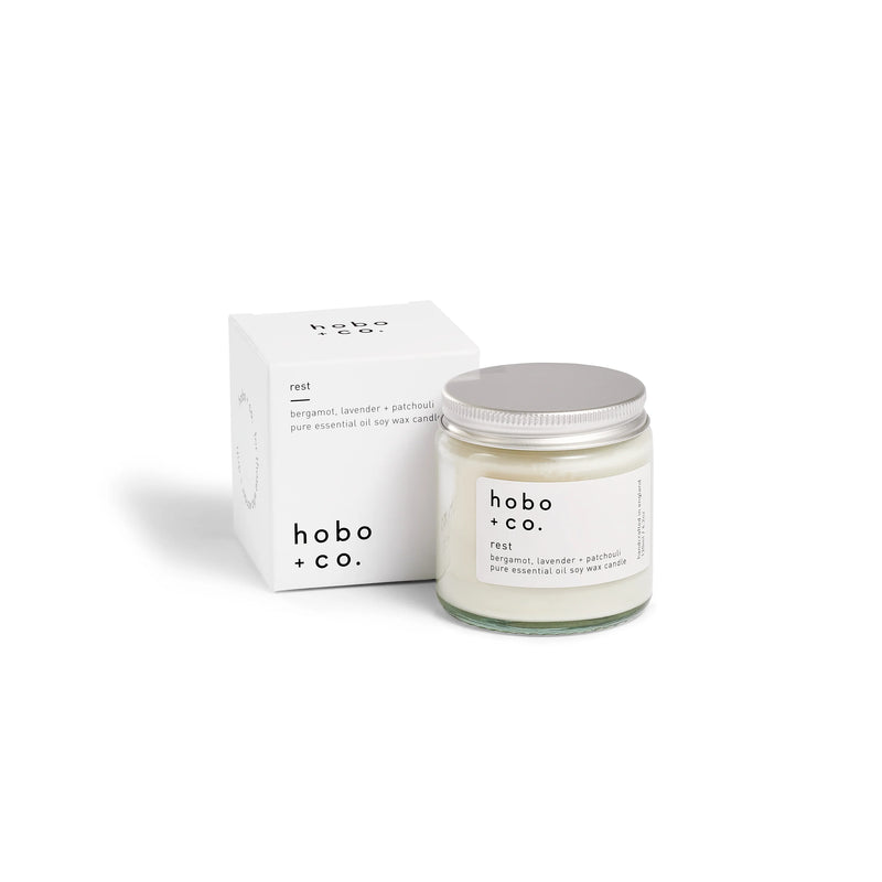 Hobo + Co candle and packaging on a white background